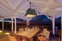 cool dining room of Saint Barth Villa Lagon Bleu luxury holiday home, vacation rental