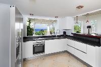 cool modern kitchen of Saint Barth Villa Lagon Bleu luxury holiday home, vacation rental