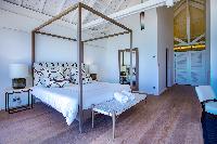 cool four-poster bed in Saint Barth Villa Bleu luxury holiday home, vacation rental