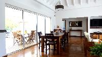 cool dining room of Saint Barth Villa Petit Paradis luxury holiday home, vacation rental