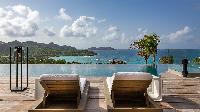 cool poolside deck of Saint Barth Villa Neo luxury holiday home, vacation rental