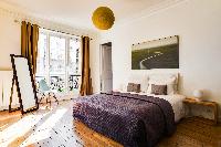 lovely bedroom with balcony at République - Voltaire luxury apartment