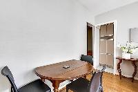 a three-seater dining area in paris luxury apartment