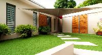 neat lawn of Saint Barth Villa Cumulus luxury holiday home, vacation rental