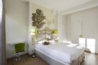 fresh and clean bedding in Marais - Saint Claude luxury apartment