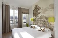 awesome bedroom accents in Marais - Saint Claude luxury apartment