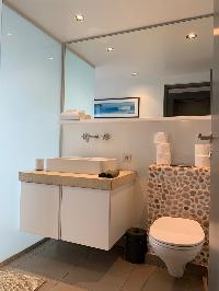 clean toilet and bath in Saint Barth Villa Roche Brune luxury holiday home, vacation rental
