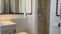 clean toilet and bath in Saint Barth Villa Lagon Rose luxury holiday home, vacation rental