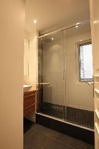 dapper shower area in Passy La Tour luxury apartment