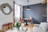 cozy living area with comfortable atmosphere 1-bedroom Paris luxury apartment