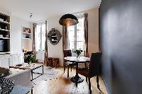 rustic dining areafor two in a 1-bedroom Paris luxury apartment